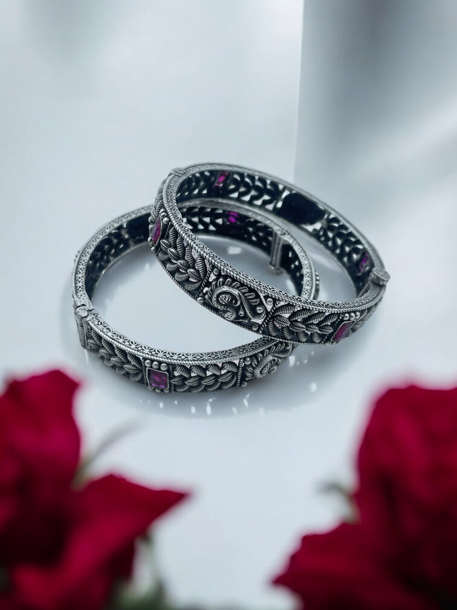 Elegant peacock‑motif stamped bangles